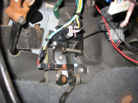 1995 Ford C-350 (Centurion Conversions) - Interior view of vehicle's brake pedal mechanism and electrical connections.
