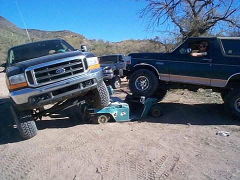 1993 Ford Bronco - Scott and Doug flexin on a old golf cart...