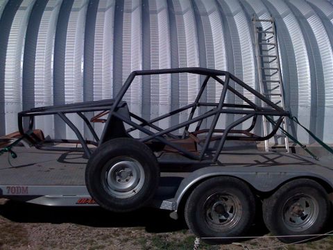 1994 Ford Bronco - A custom-built roll cage frame sits on a trailer, ready for transport or further modification.