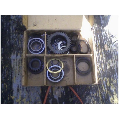 1972 Ford Ranchero - A transmission rebuild kit is shown in a compartmentalized cardboard box.