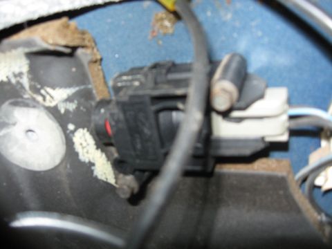 1990 Ford Bronco - This image shows a close-up view of a vehicle's electrical connector and wiring harness.