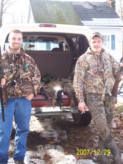 1993 Ford Bronco - Hunters display their duck haul next to a pickup truck, with a date stamp indicating the photo was taken on December 29, 2007.