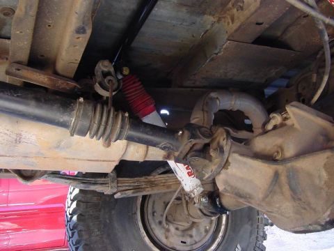 1993 Ford Bronco - Davis Laracuente's Bronco...The rear shock mount was moved up and out of the way on the axle tube...
