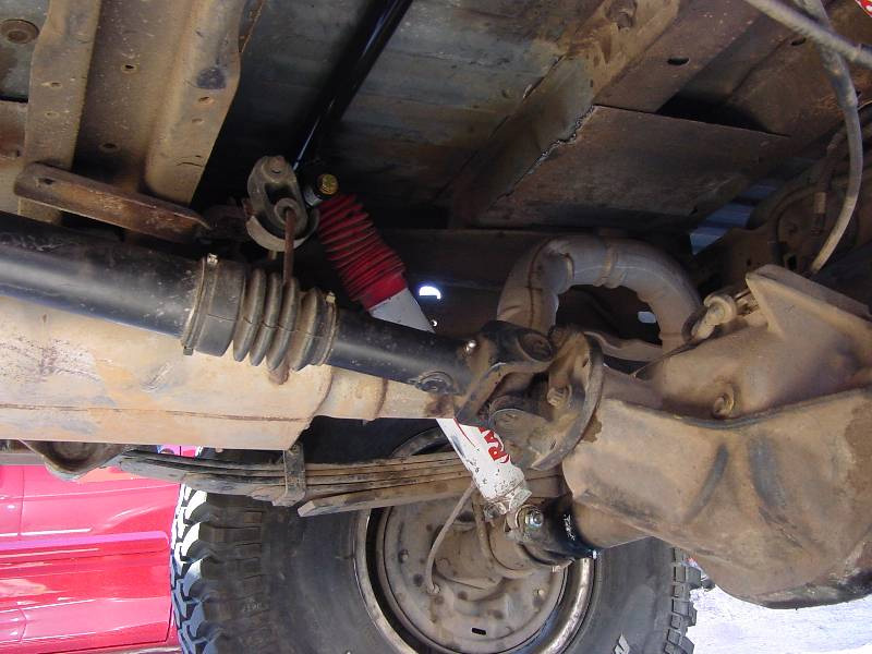 Davis Laracuente's Bronco...The rear shock mount was moved up and out of the way on the axle tube...