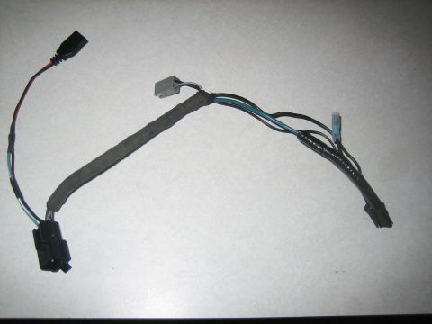 1995 Ford Bronco - A vehicle wiring harness is laid out against a neutral background.