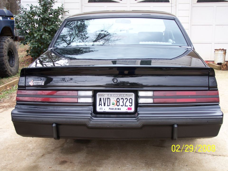 Rear view of a black 1987 Buick Regal Grand National with Georgia license plate AVD 8329
