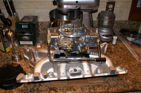 1972 Ford Ranchero - A close-up view of a carburetor and intake manifold assembly, likely for a performance upgrade.