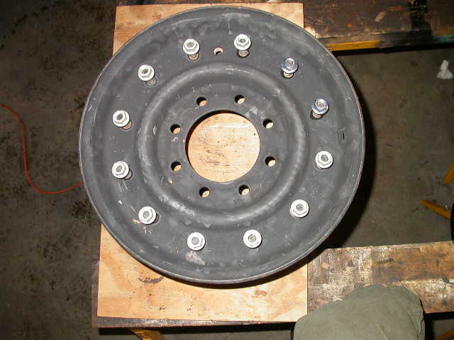 Outer rim with the factory center still intact.  Using this center the wheel would have a 7" back spacing, WAY too much.