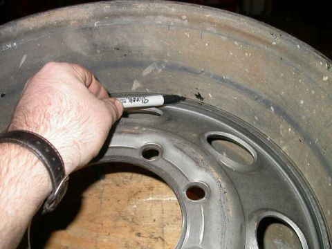 1990 Ford Bronco - Mark all the way around the lip of the center with a sharpie. This gives you a good guide of where to grind the paint off.