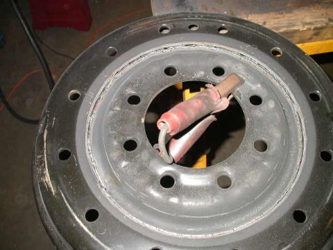 1990 Ford Bronco - Old center cut out, it just takes a tap with a hammer to make it drop out.