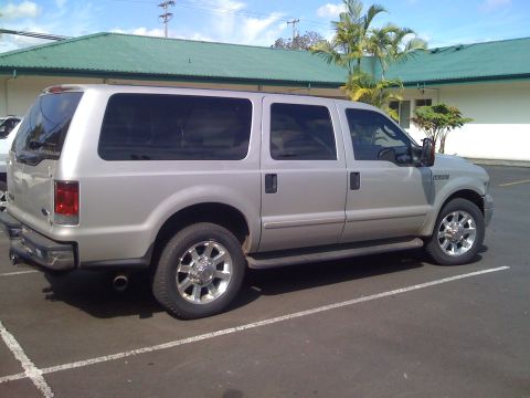 2005 Ford Excursion - This silver 2005 Ford Excursion is parked in a lot.