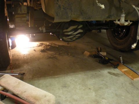 1993 Ford Bronco - The underside of a vehicle shows its differential and suspension components.