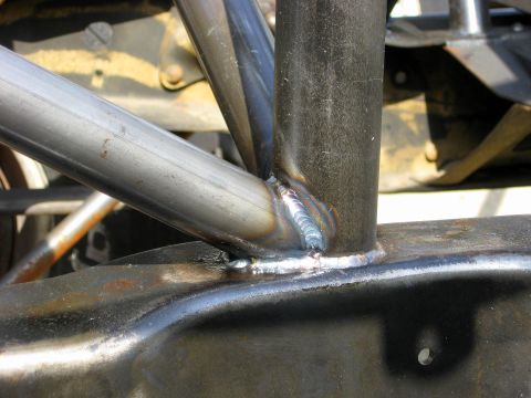 1995 Ford Bronco - Welded tubing forms a structural component, likely for off-road or racing modifications.