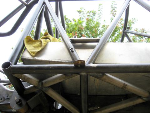 1995 Ford Bronco - Custom roll cage and fuel tank assembly, likely for a racing application.