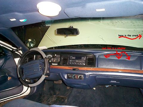 1995 Ford Crown Victoria - an interior shot, the line across the dash and windshield are a reflection, there is no crack in the dash or anything, and the windshield c…