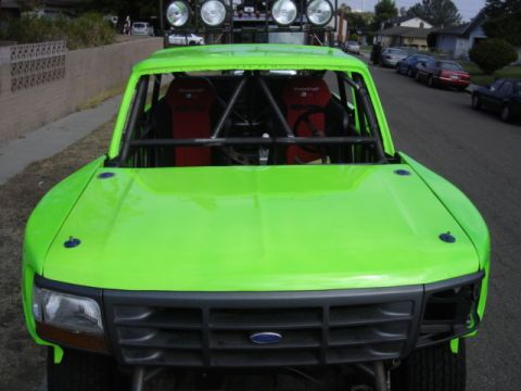 1995 Ford Bronco - A custom off-road truck, modified from a 1992 Ford F-150, is shown from the front.