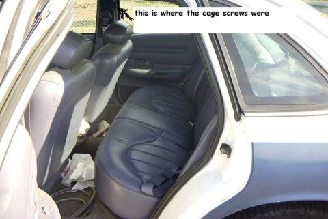1995 Ford Crown Victoria - this is the backseat, nearly perfect, only the trim cutout for the cage screws are visible.