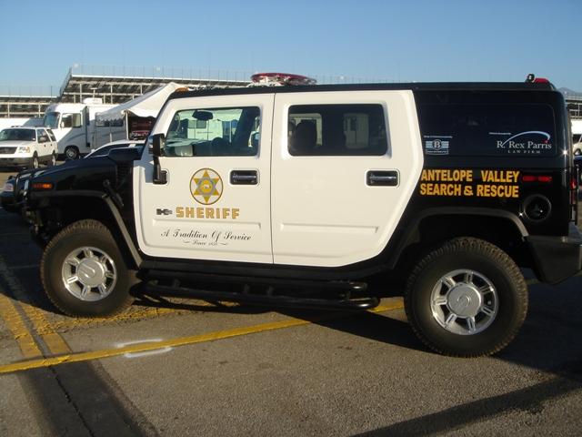 Hummer H2 SUV with "SHERIFF" and "ANTELOPE VALLEY SEARCH & RESCUE" markings