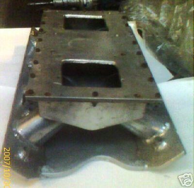 1972 Ford Ranchero - This metal intake manifold is a component, not a vehicle, and its year cannot be determined from the image.