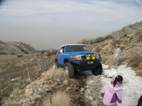 2007 Toyota FJ Cruiser - Some place est about 4000 ft Tony went on ahead to scout a snowy slushy, steep section of trail. In the process lost traction & slid very c…