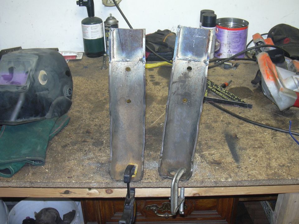 I had to extend the shock mounts to allow for 15" travel shocks