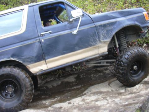 1991 Ford Bronco - This modified 1991 Ford Bronco is shown navigating a rocky, off-road trail.