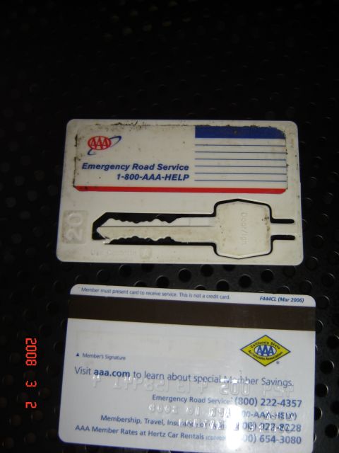 1993 Ford Bronco - This AAA card features an integrated key and emergency road service contact information.