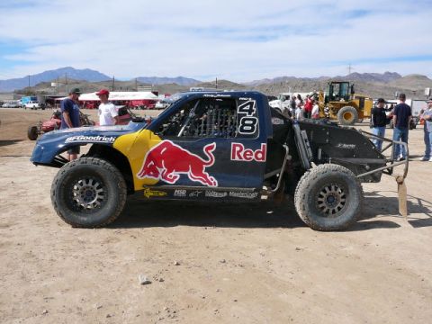 1988 Ford Bronco - This custom off-road truck, sponsored by Red Bull, features a distinctive livery and racing number 48.