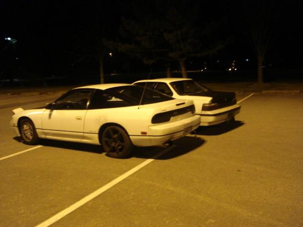 White 1991 Nissan 240SX coupe, 3/4 front view, parked at night