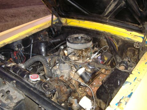 1987 Ford Crown Victoria LTD - Close-up view of a vehicle's engine bay, showing various components.
