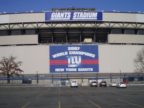1978 Ford Bronco - Exterior of Giants Stadium displaying banners for the New York Giants' 2007 championship season.