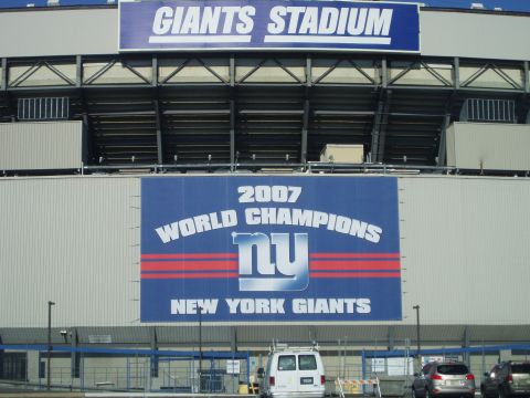 1978 Ford Bronco - The exterior of Giants Stadium displays a large banner commemorating the New York Giants' 2007 championship season.