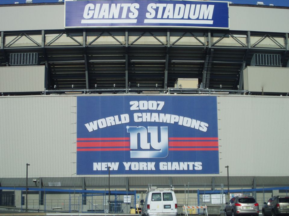 Giants Stadium exterior with a banner celebrating the 2007 World Champions New York Giants