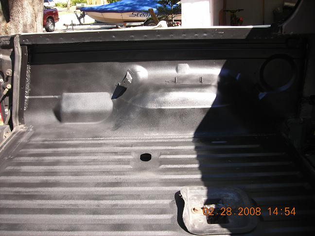 Interior of a truck bed with a spray-in liner. Date stamp reads 02.28.2008