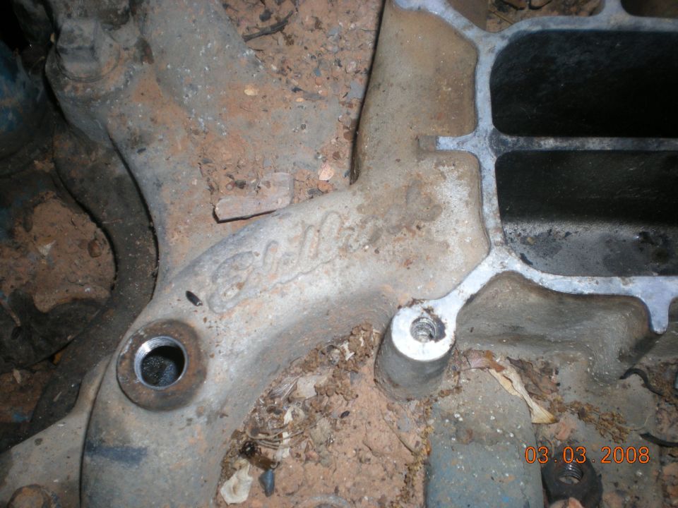 Close-up of an engine intake manifold with "Edelbrock" cast into it