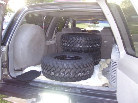 1989 Ford Bronco - Fresh set of tires in the back of my Burban.