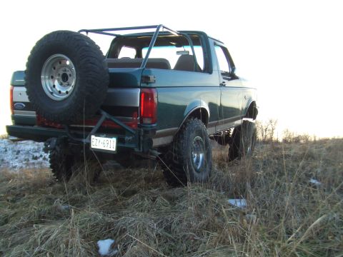 1996 Ford Bronco - This 1996 Ford Bronco is shown from the rear, equipped with off-road tires and a spare tire carrier.