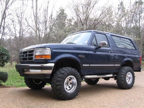 1967 Ford Mustang - This lifted Ford Bronco is equipped with large off-road tires and aftermarket wheels.
