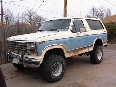 1981 Ford Bronco - This 1981 Ford Bronco features a distinctive two-tone blue and white paint scheme and a lifted stance.
