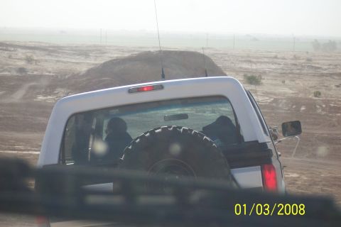 1990 Ford Bronco - Rear view of a 1990 Ford Bronco with a spare tire mounted externally.