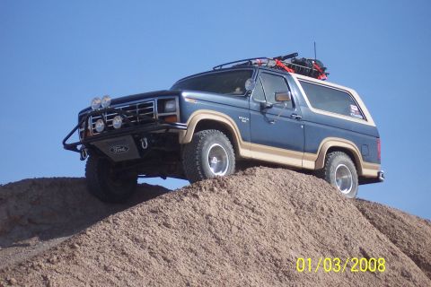 1990 Ford Bronco - This Ford Bronco is equipped with an aftermarket bumper and lights, ready for off-road adventure.