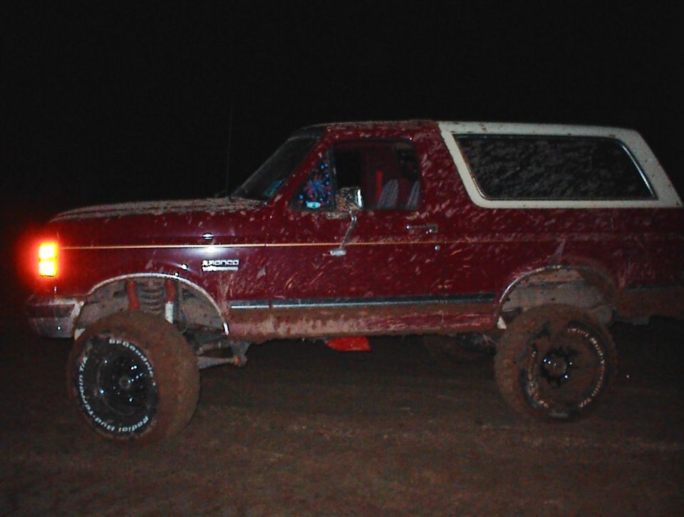 Side view of a muddy 1981 Ford Bronco