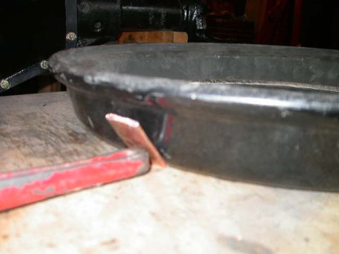 1990 Ford Bronco - Backing plate covering back side of hole.