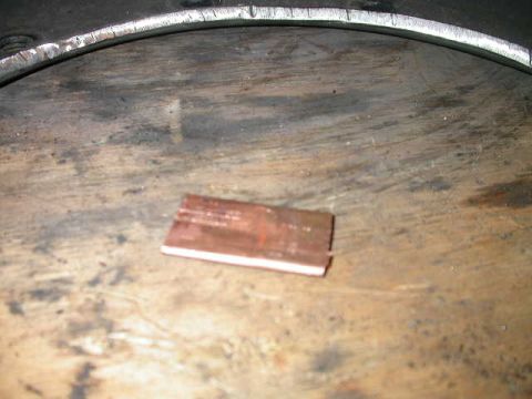 1990 Ford Bronco - Made a copper backing plate by smashing a short section of copper pipe flat.