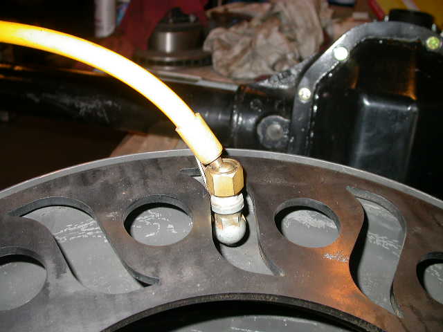 After checking for clearance with the rock ring in place it became clear that while a short valve stem is generally better for wheeling, you need a long one when installing a rock ring.  Either that, or a different style clip on air chuck.