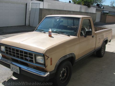 1968 Ford Mustang - Photograph of a tan Ford Ranger pickup, not a technical document.