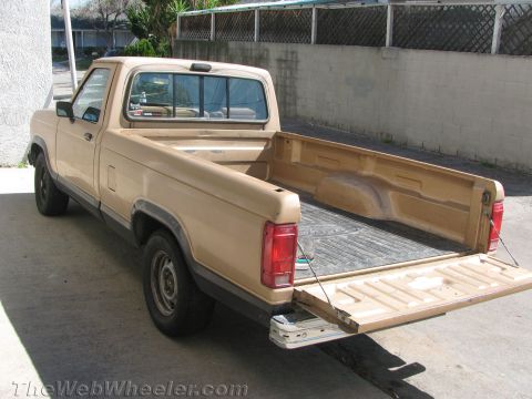 1968 Ford Mustang - Photograph of a tan Ford Ranger pickup bed, not a technical document.