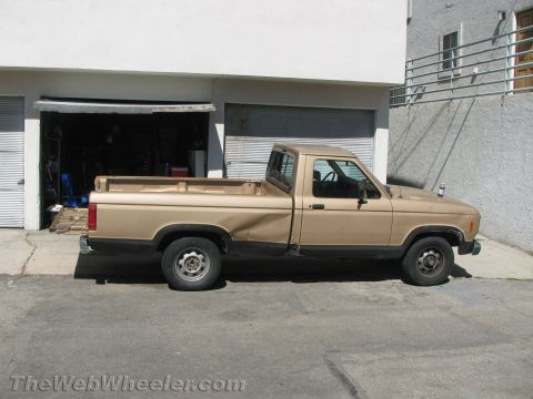 1968 Ford Mustang - Side-view photograph of a tan Ford Ranger pickup, not a technical document.
