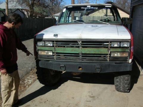 1975 Chevrolet Blazer - test with with all grill pieces. Capitalj pionting to my bashed fender area.