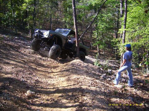 1978 Ford Bronco - This modified vehicle navigates a challenging off-road course.